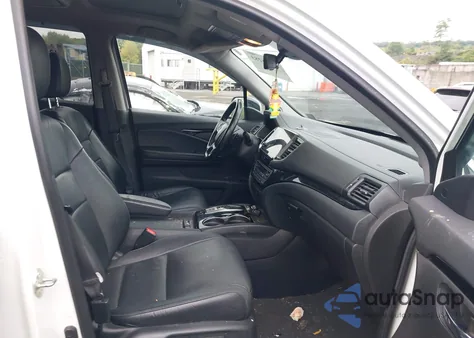 2021 Honda Pilot Awd Touring 7 Passenger z USA, uszkodzony, nr VIN 5FNYF6H68MB024972